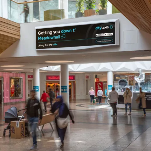High level extra wide advert for City Taxis in Meadowhall