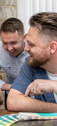 Thomas Smith and Mike Garlick from Fishtank Agency laughing