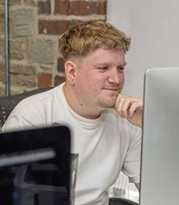 Will Taylor from Fishtank Agency looking at his computer screen