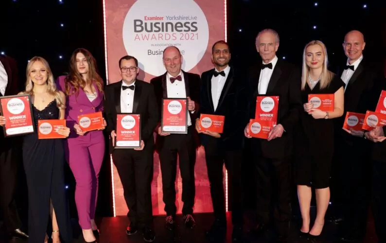 A photograph of some of the Fishtank team holding their awards