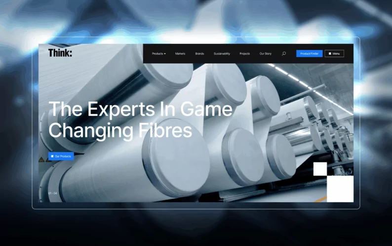 Large industrial spools of fibre are being processed in a factory setting. The website text reads: 