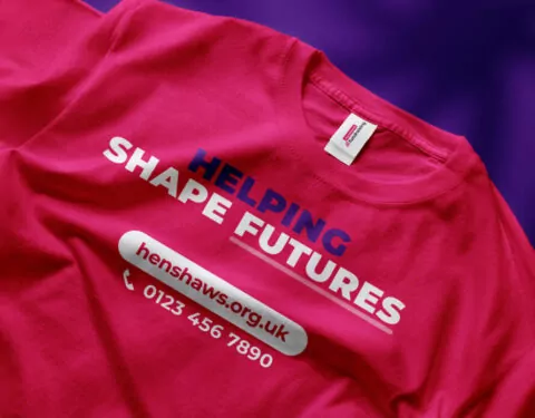 A pink t-shirt displays 