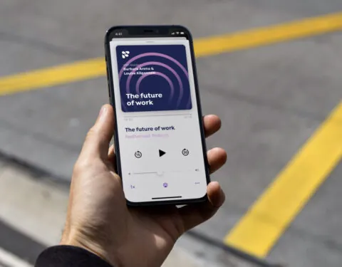 A mobile phone displaying a Festive Road podcast.